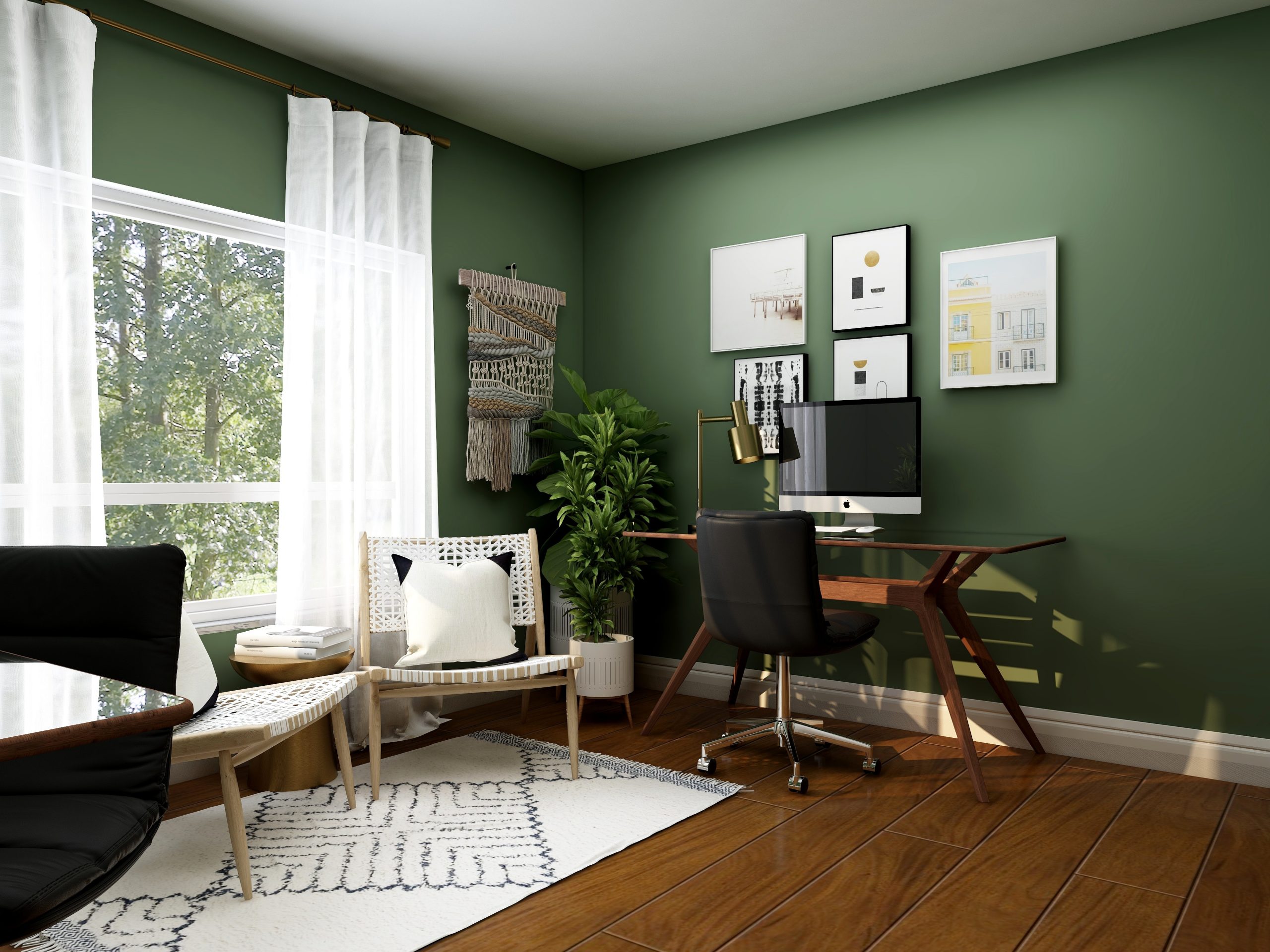 Home office with green walls, desk and chair, white curtains and paintings on wall